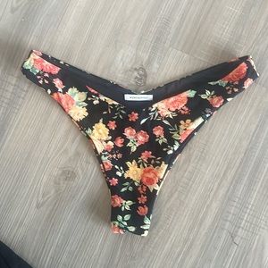 We wore what DELILAH black floral bikini bottom size M